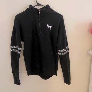 PINK quarter zip sweatshirt with zebra banding on the arms